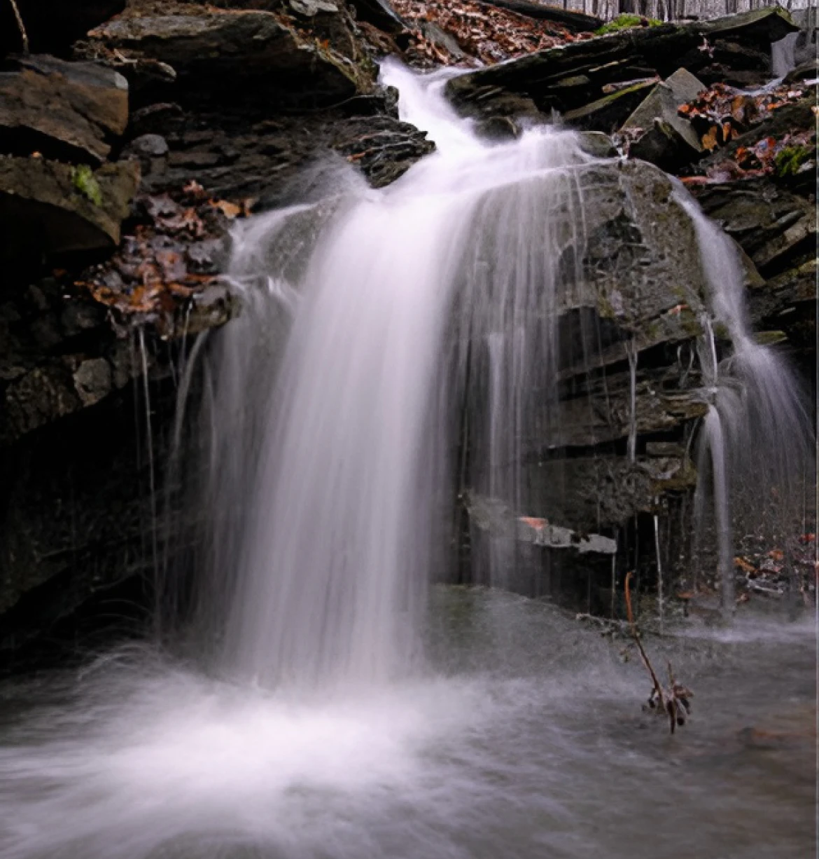 Flowing water over mossy rocks